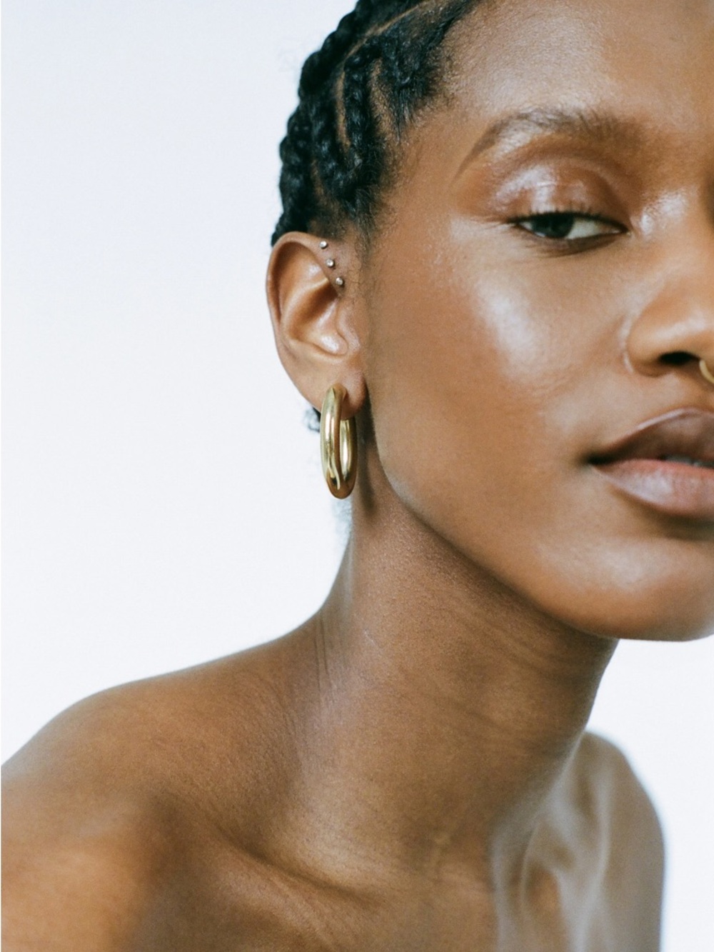 Laura Lombardi Brass Mini Curve Hoop Earrings